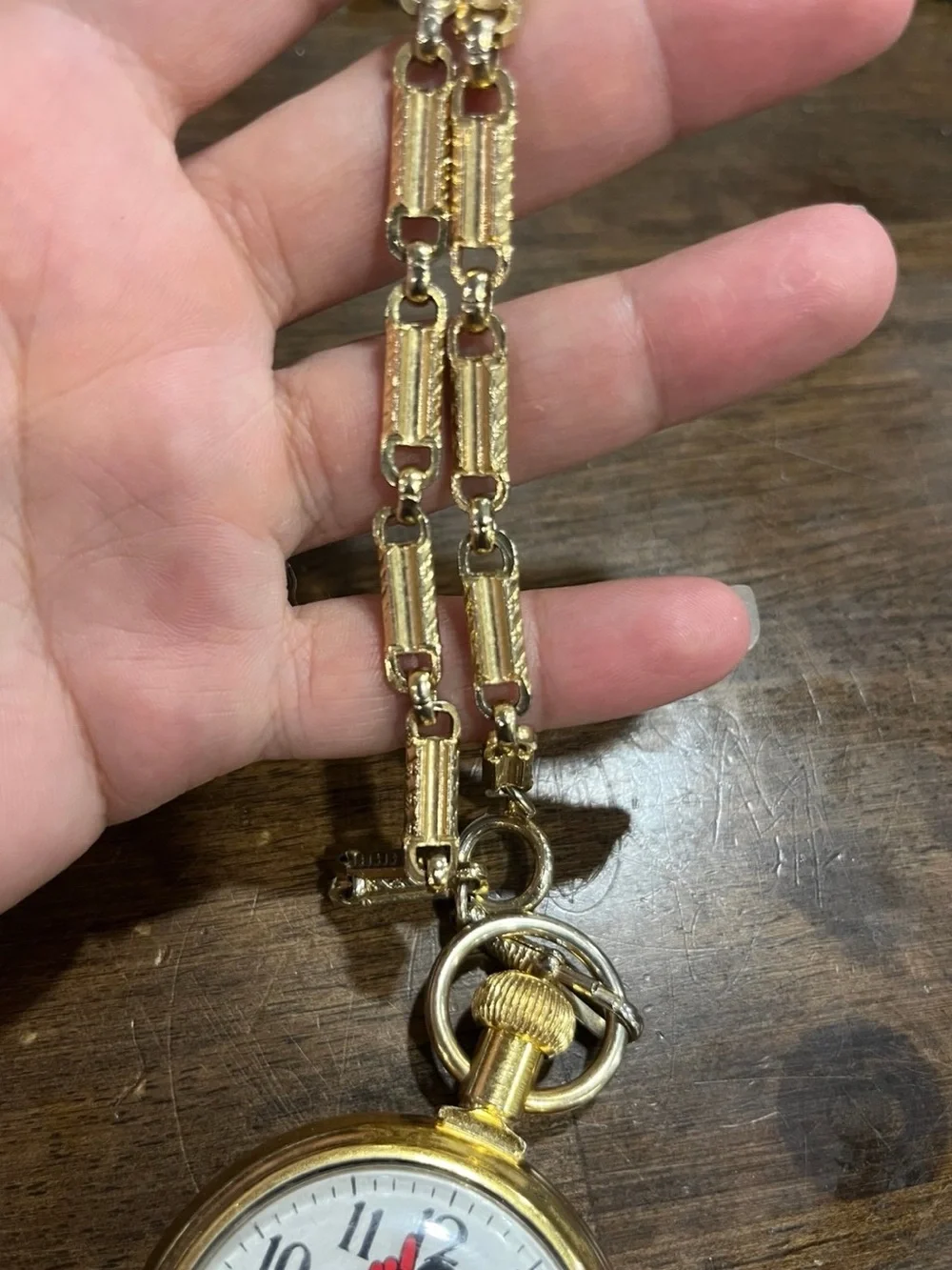 Disney gold tone